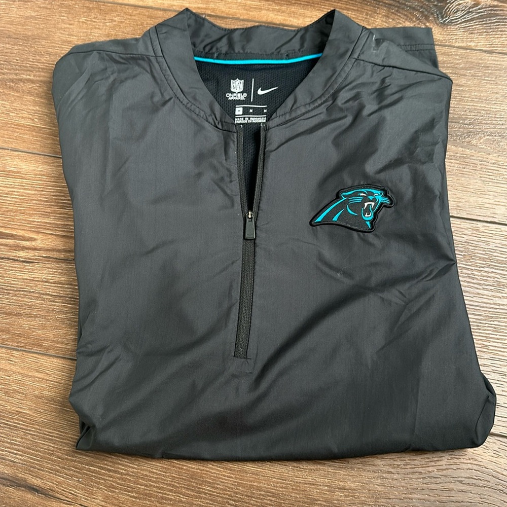 Nike Carolina Panthers half zip jacket (worn once) size: Medium.